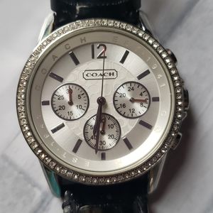 Women watch Coach
